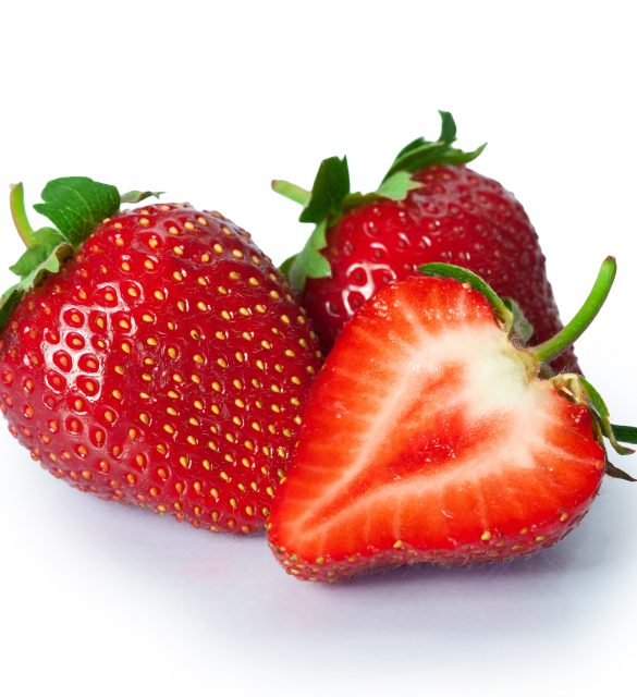 Ripe fresh strawberries were placed on white background