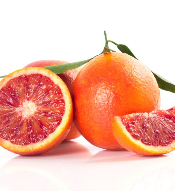 Blood red oranges isolated on white background