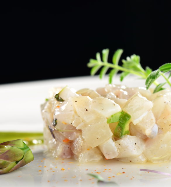 Fine dining appetizer, fish tartare with asparagus